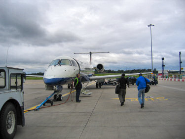 Picture of people boarding a plane