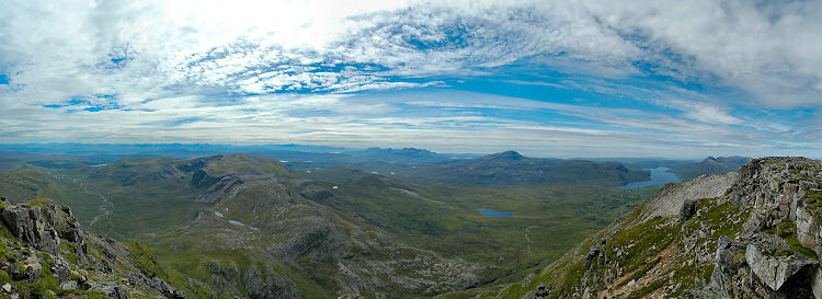 Picture of a panoramic view over a rocky landscape with various lochs