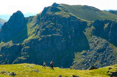 Picture of walkers in front of a mountain