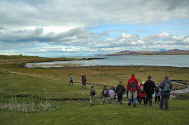 Picture of walkers near a shore