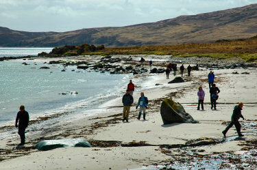 Picture of walkers on a beach
