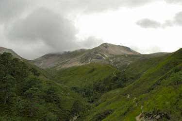 Picture of a mountain almost clear of clouds