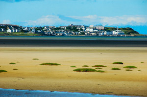 Picture of a coastal village seen across a bay