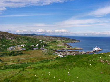 Picture of a view over a village with a pier