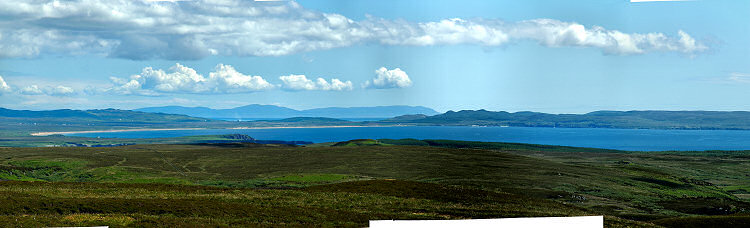 Picture of a panoramic view over a wide bay with a very long beach